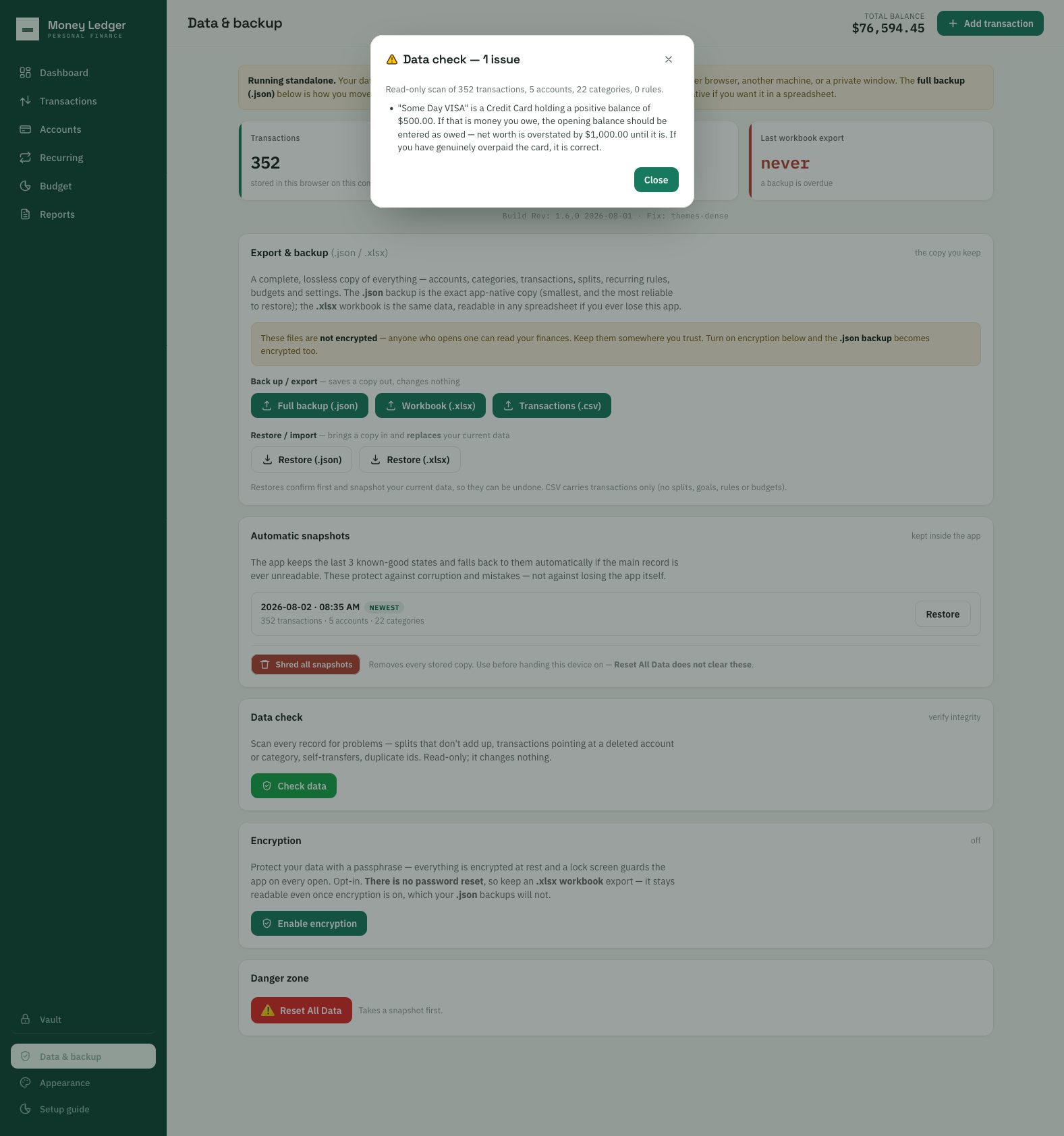 The app's data-check dialog reporting one issue: a credit card holding a positive balance of $500.00, warning that net worth is overstated by $1,000.00 until the opening balance is entered as owed, and noting that if the card was genuinely overpaid the figure is correct.